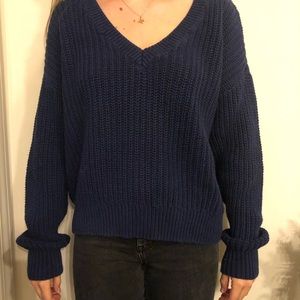Navy blue knit sweater.